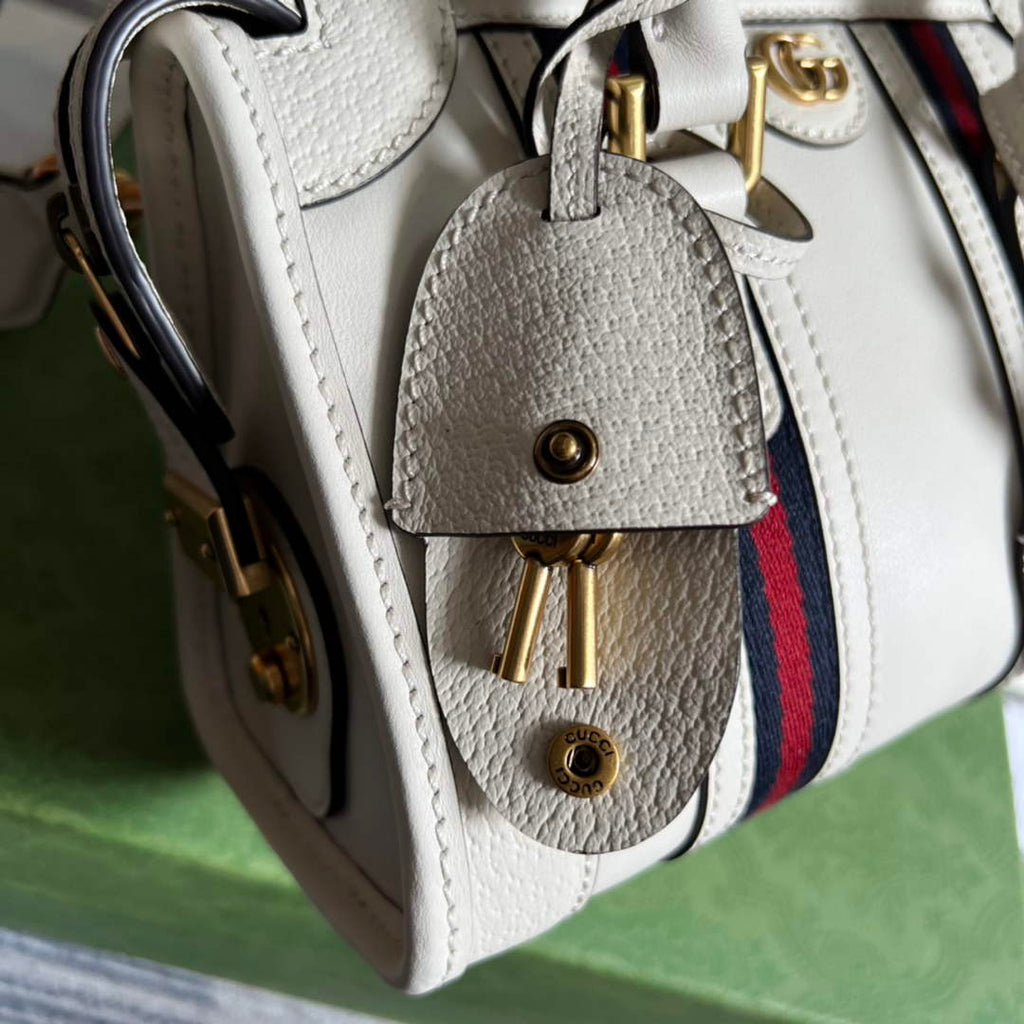Gucci 715771 Mini canvas top handle bag White leather