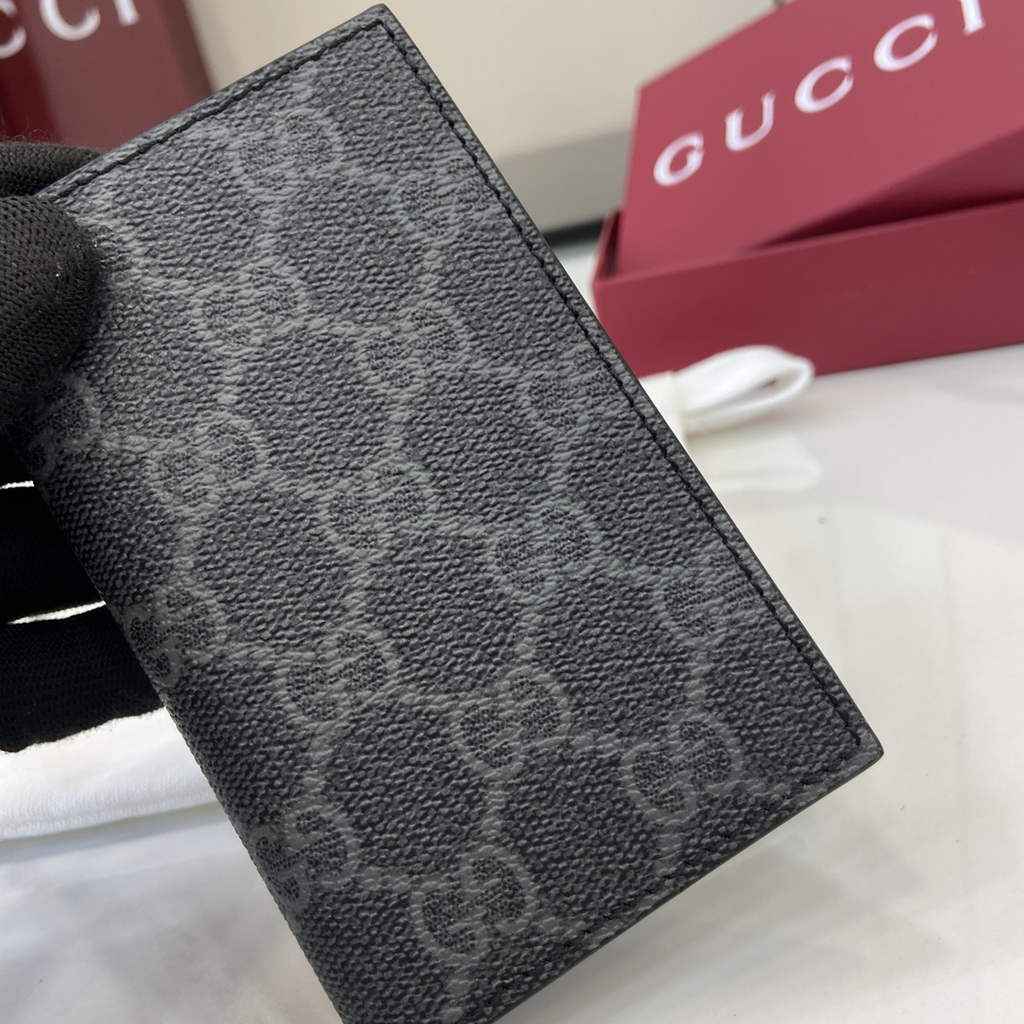 Gucci GG Emblem bi-fold card case, 821209 in black fabric