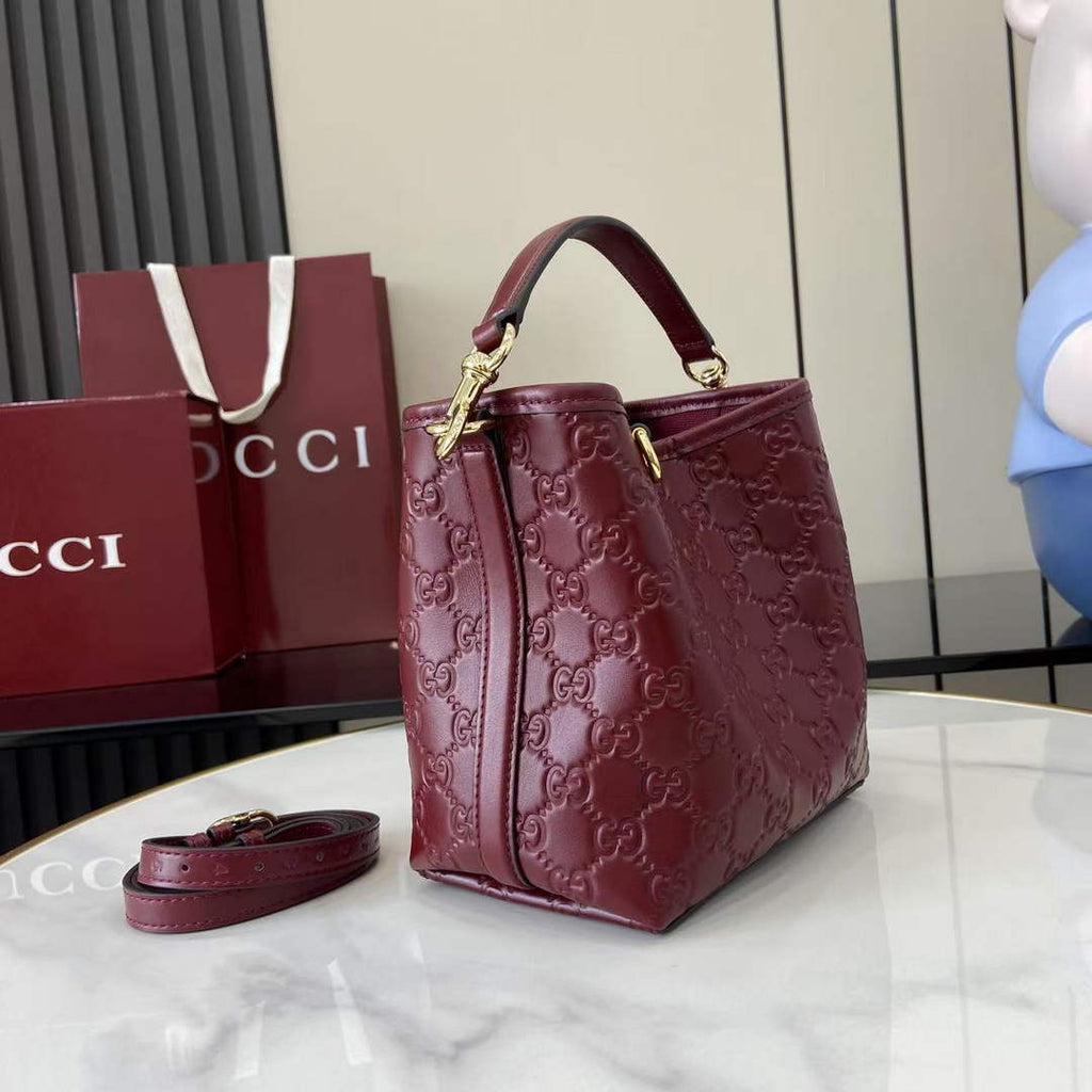 Gucci GG Emblem small bucket bag 815118 in GG wine red leather