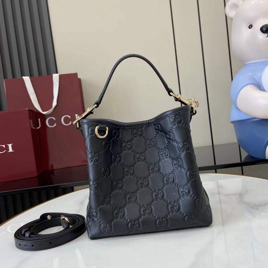 Gucci GG Emblem small bucket bag 815118 in GG black leather