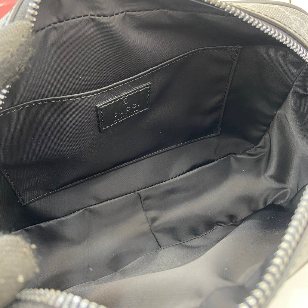 Gucci GG Emblem small toiletry case, ‎821164 in black fabric
