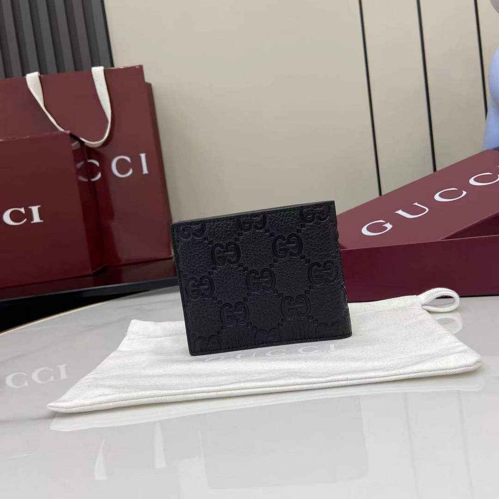 Gucci Imprint bi-fold wallet - Black GG Leather 835001