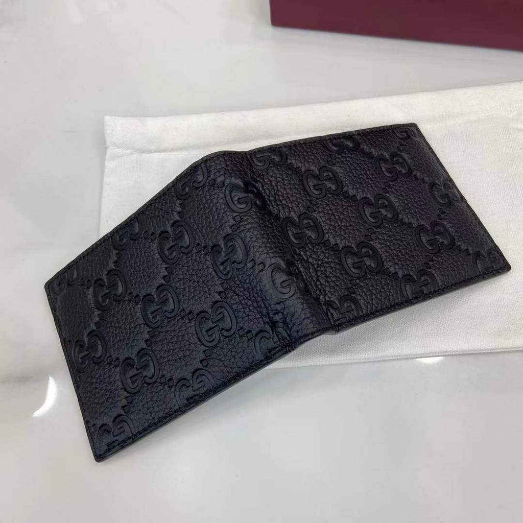 Gucci Imprint bi-fold wallet - Black GG Leather 835001