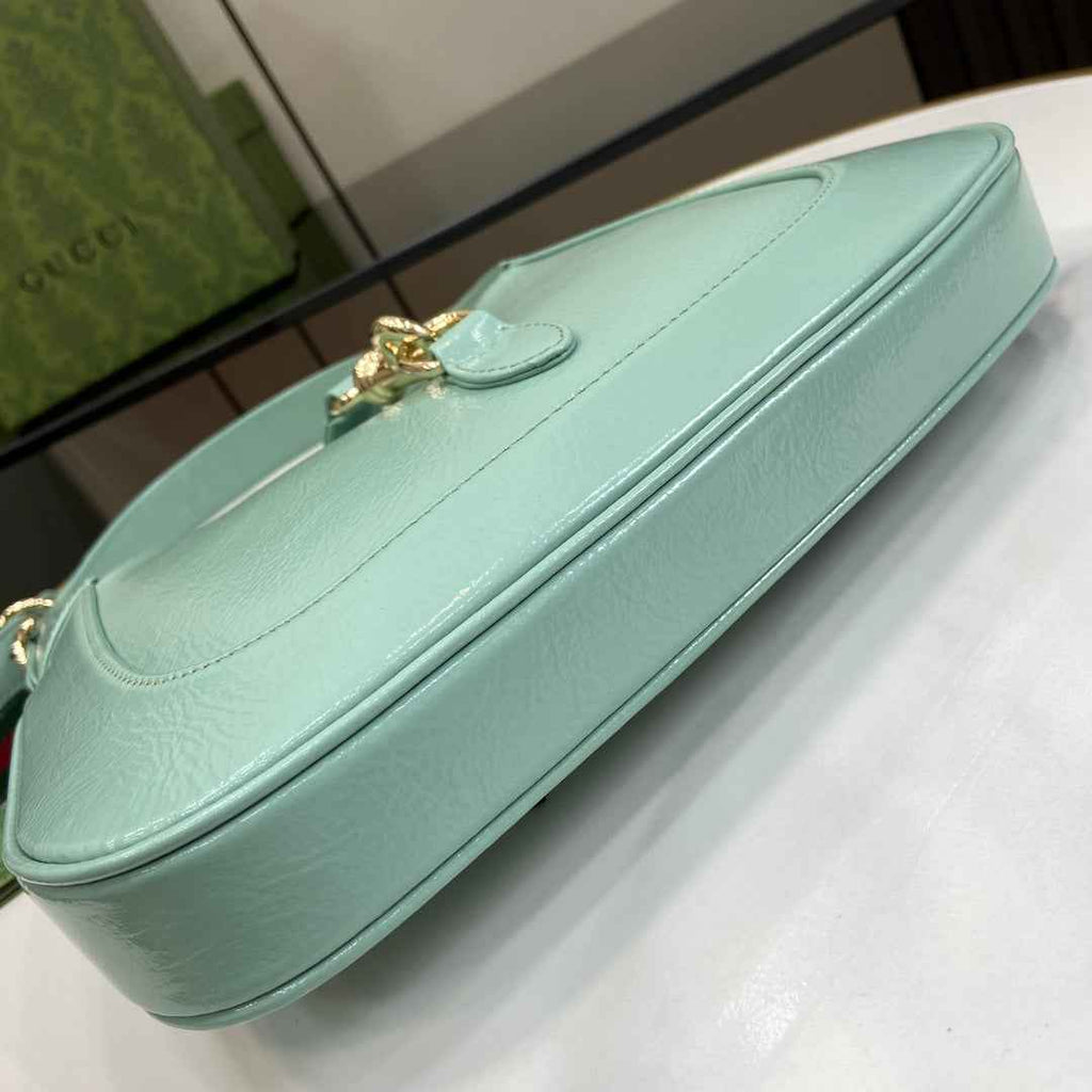 Gucci Jackie small shoulder bag in light blue patent leather 782849